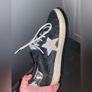 Black and white snakeskin sneakers